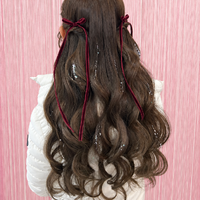 画像11874：花飾り低めシニヨン｜梅田・北新地ヘアセット