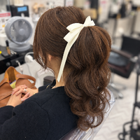 画像11881：花飾り低めシニヨン｜梅田・北新地ヘアセット