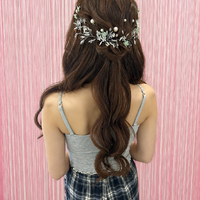 画像11895：花飾り低めシニヨン｜梅田・北新地ヘアセット