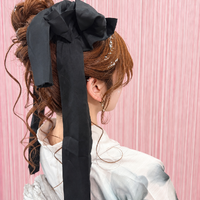 画像11926：花飾り低めシニヨン｜梅田・北新地ヘアセット