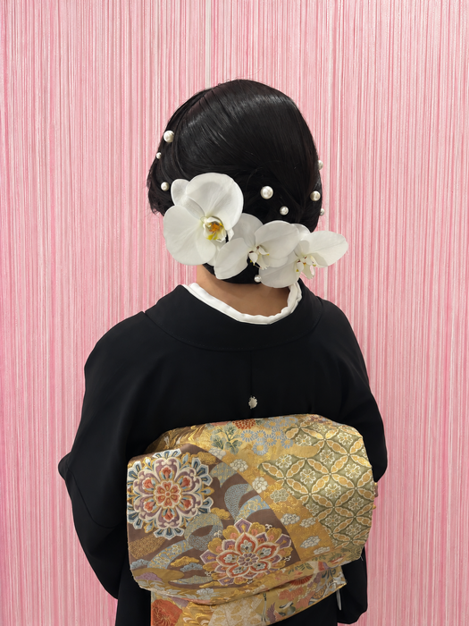 画像11939：花飾り低めシニヨン｜梅田・北新地ヘアセット